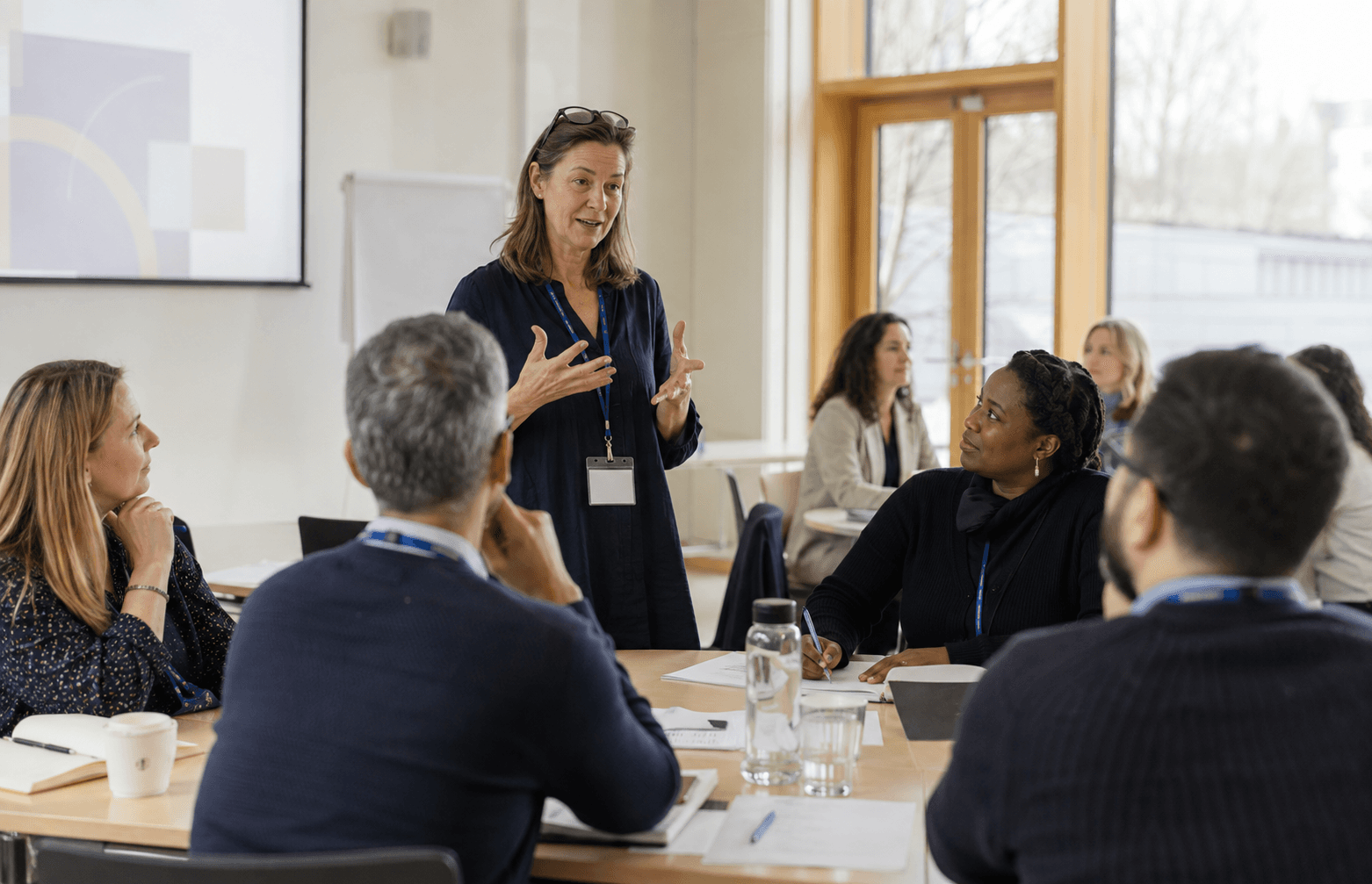 An educator leading a professional development workshop for teachers
