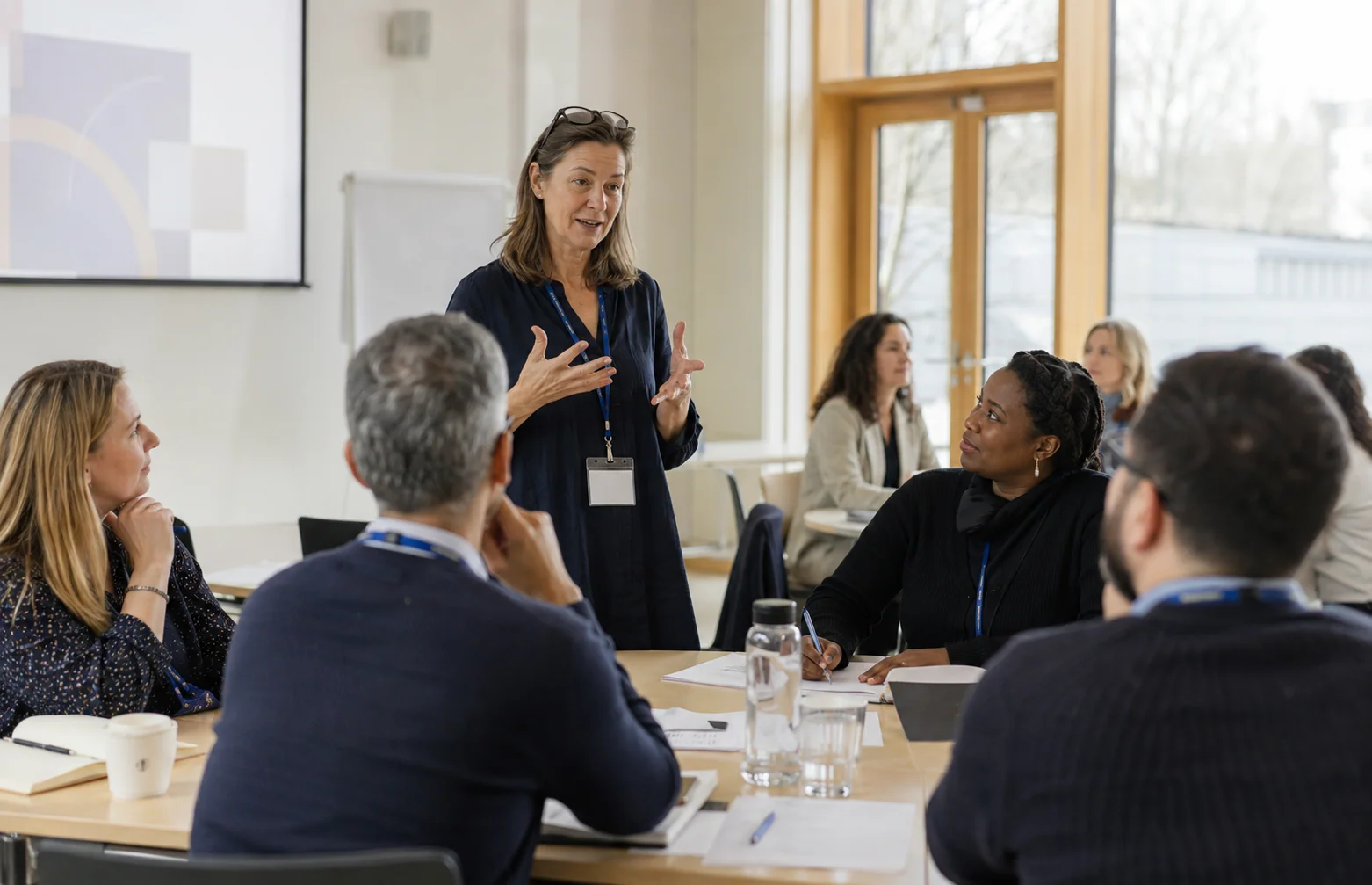 An educator leading a professional development workshop for teachers